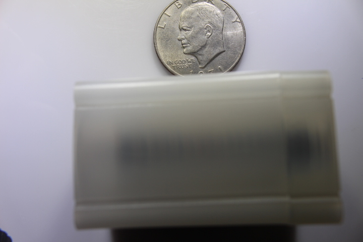 lot 15C image: 1 Roll Eisenhower Dollars 1971-1978 in Plastic Container Contains 20 $1 coins