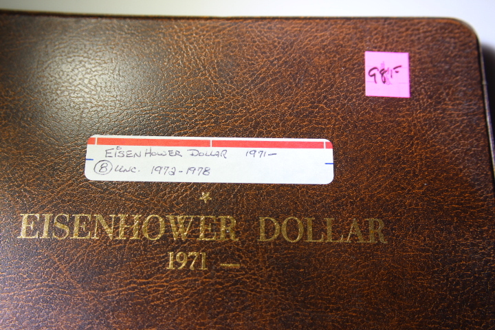 lot 98F image: 8 Eisenhower Dollars $1 UNC. Book 1971-1978  Item# 316