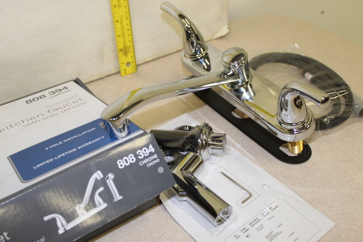 lot 118 image: Kitchen Faucet w sprayer - New in box