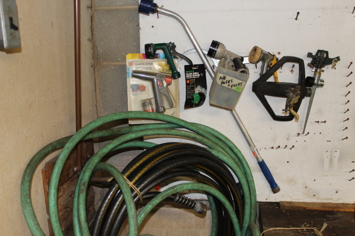 lot 101 image: Garden Hose  Sprayer Lot