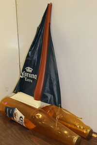 lot 27 image: Corona Extra Inflatable Sailboat