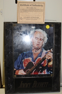 lot 89 image: Jimmy Buffet Autographed Picture