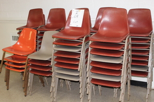 lot 68 image: Stacking Chair LOT- 64 chairs for one money