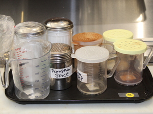 lot 61 image: Shaker  Measuring Cup  Sugar Dispensers Lot