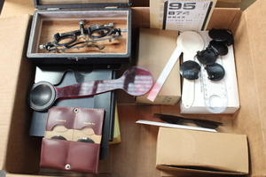 lot 15 image: Misc box of vintage eye exam items Lot