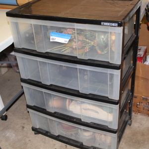 lot 193 image: Plastic Storage Bin and Decoration Lot