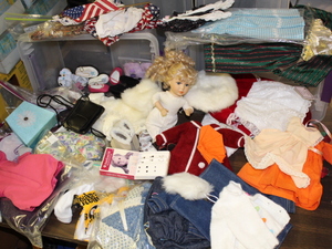 lot 176 image: Doll and Doll Clothes Lot