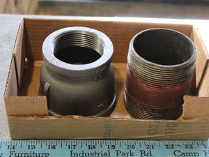 lot 240 image: 3 to 2-12 Reducing Couplings and 3 Nipple