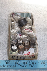 lot 349 image: 12 Caps and Plugs